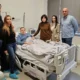 A Dodik család az elég sápadt családfő betegágyánál