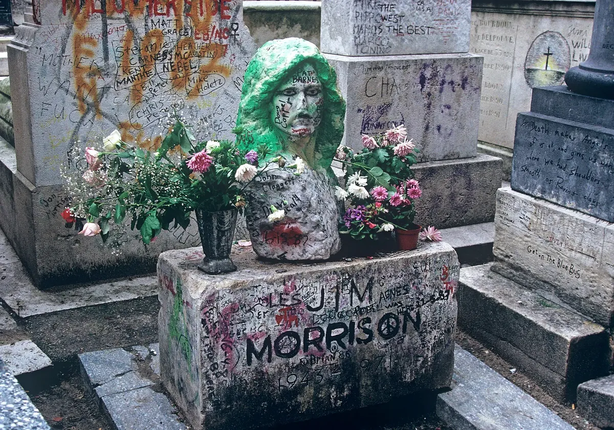 The somewhat unconventional tombstone and its surroundings